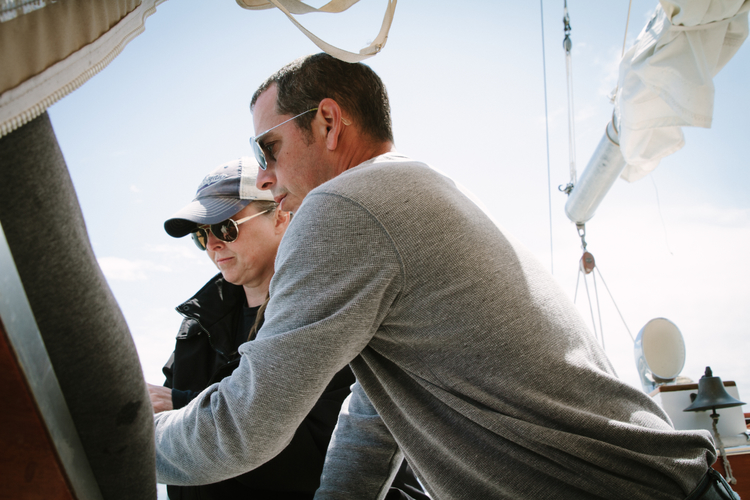 Anthony and Melissa DeGraw on the deck of Northern Light in Tawas Bay.