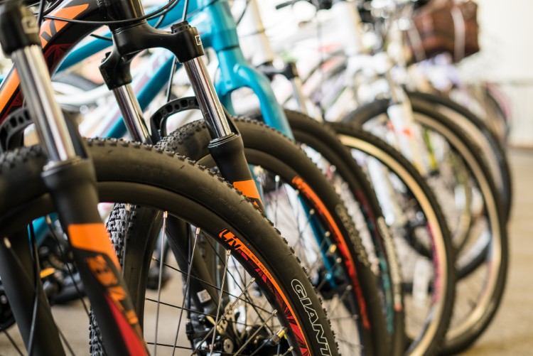 A bicycle can be locked easily, parked without a fee, and can go places most vehicles cannot.