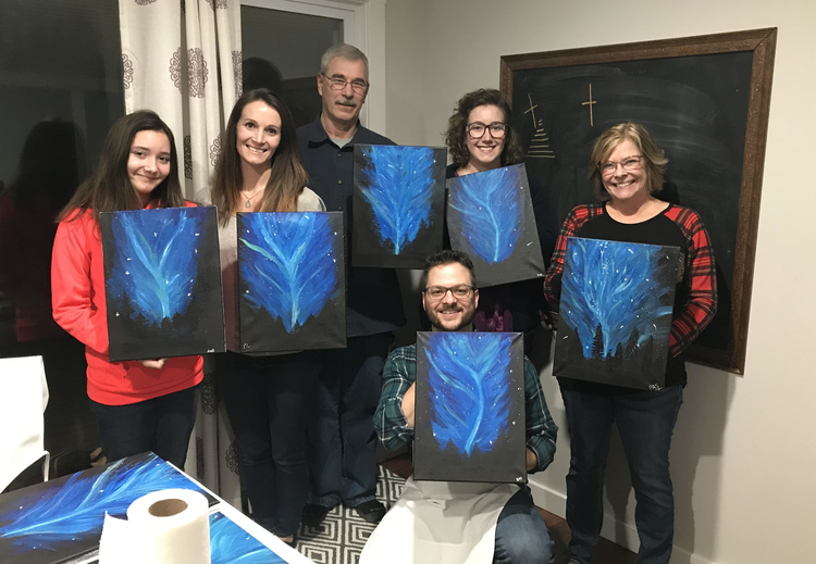 A recent group with their new painting. 