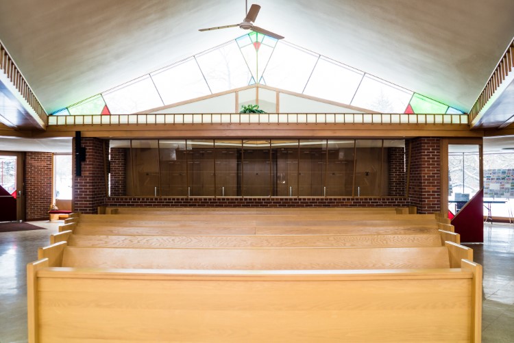 Natural light flooding inside from the peaked windows.