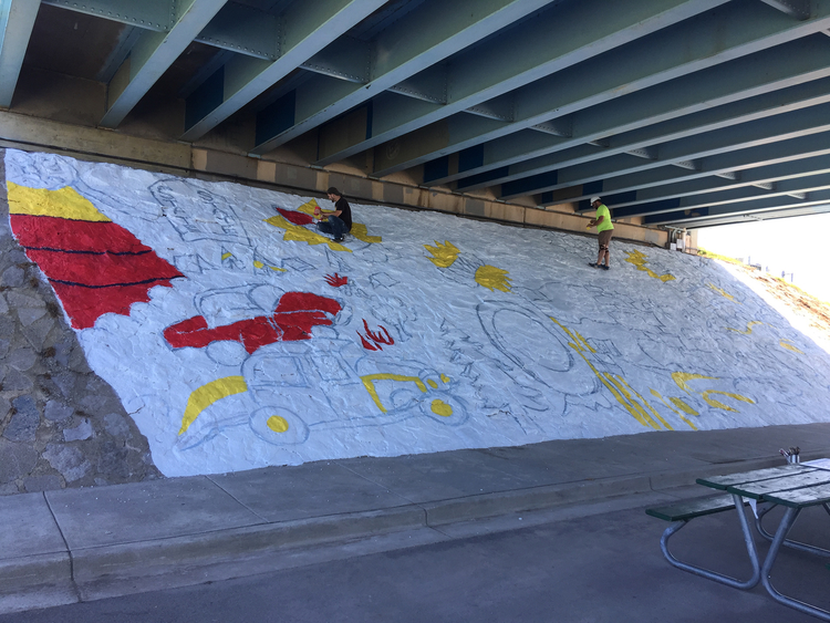 The Veterans Memorial Bridge mural in progress. 
