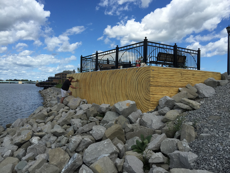 Bay City's Uptown District mural in progress.