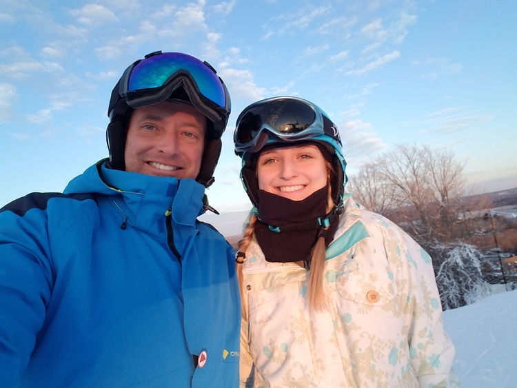 Mike Cutler, mountain manager at Crystal Mountain, skiing with daughter Bryce Cutler.