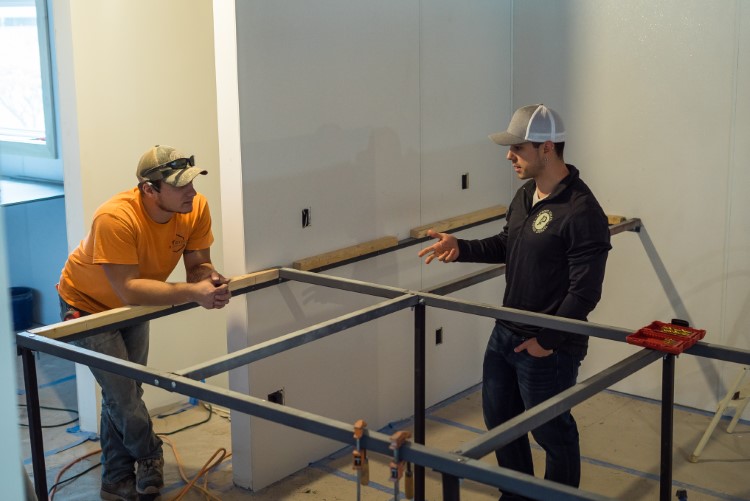 Patrick McElgunn working out some of the final construction needs.