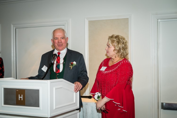 Tom and Holly Valent accepting their "Philanthropists of the Year" Award at the annual Ripple Effect event from MACF.