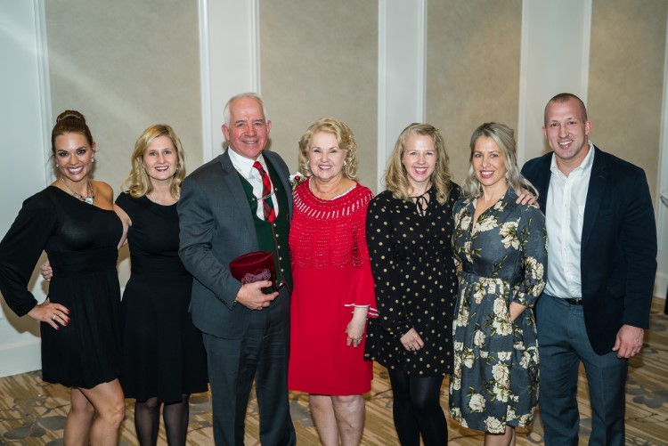 The Valent Family at the MACF Ripple Effect event after accepting their award.