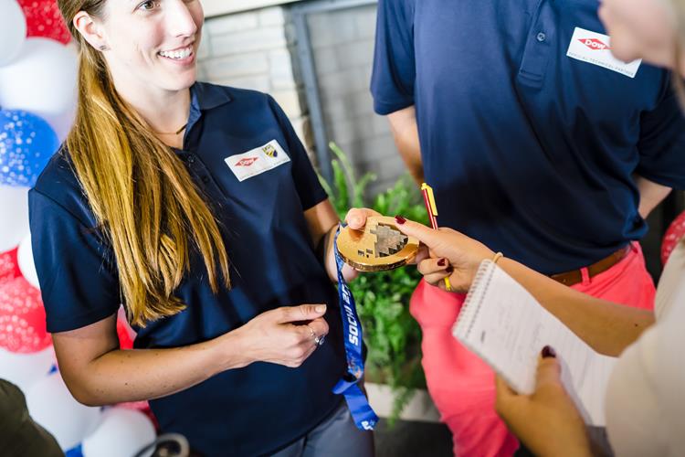 Erin Hamlin, four-time Olympian with her luge medal.