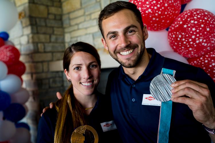 Erin Hamlin and Chris Mazdzer with their Olympic medals.