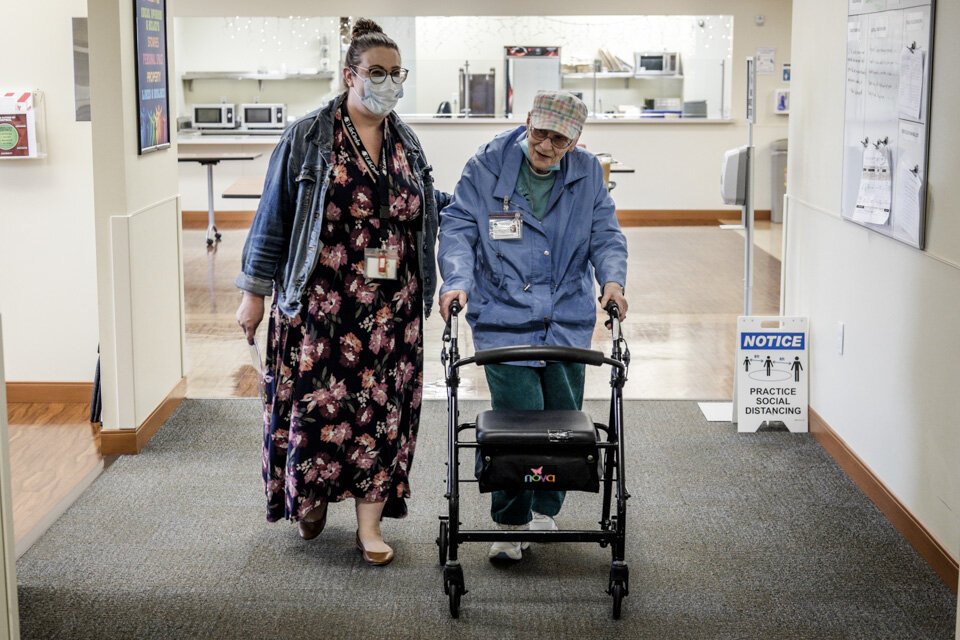 Sarah Milanowski with a PACE participant.