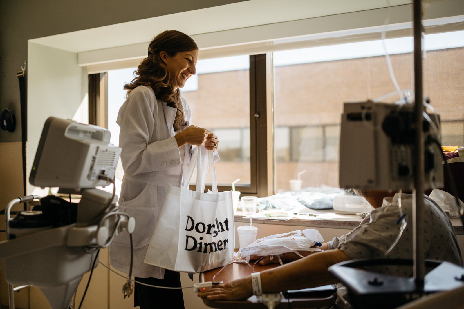 Sarah Berry explains the medically tailored meal program to a patient who is being released from Beaumont Hospital, Troy.