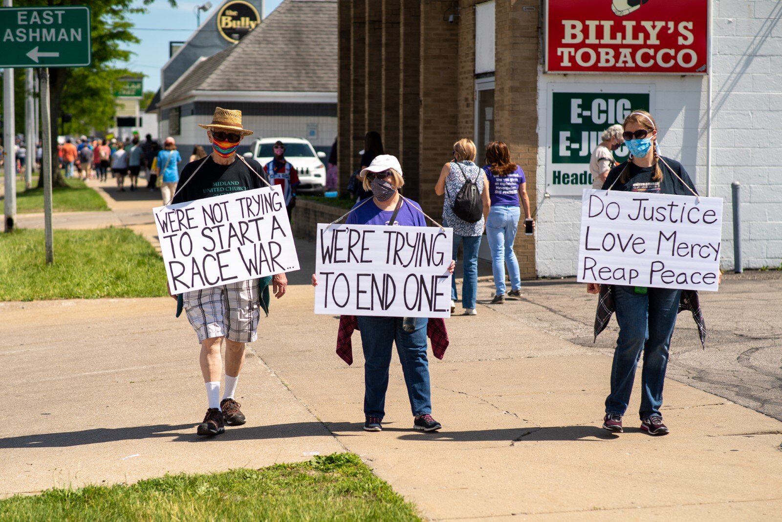 Signs from the June 7 protest in Midland.