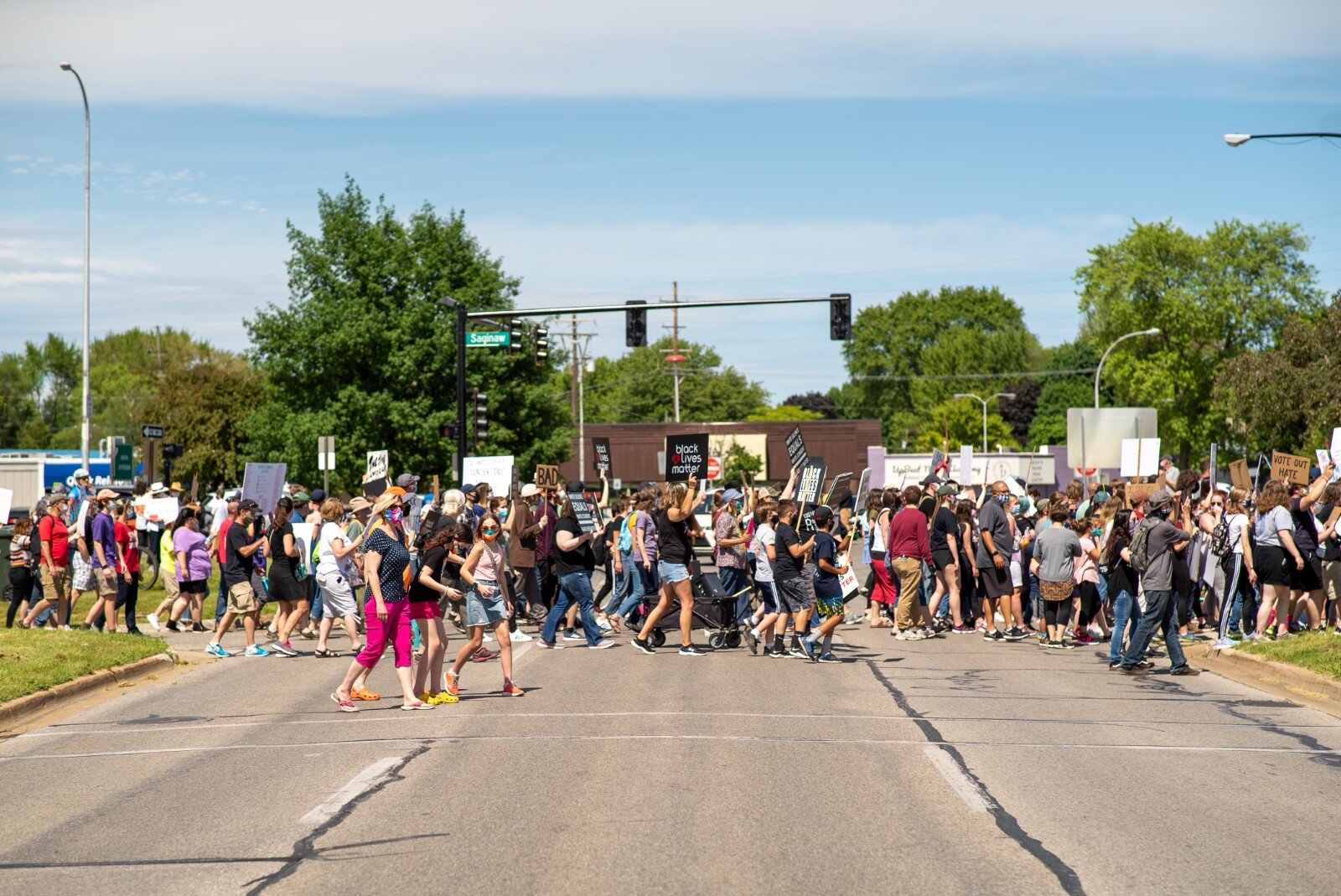 The group walking down Saginaw Road.