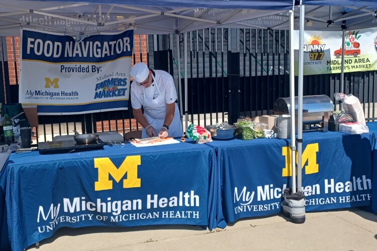 Chef Brian demonstrates cutting salmon for fish tacos