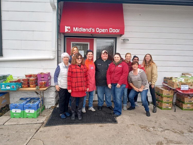 Zonta Club of MIdland members recently volunteered at the Midland's Open Door