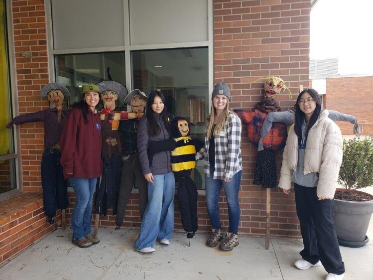 Scarecrows assembled for Little Forks Scavenger Hunt.