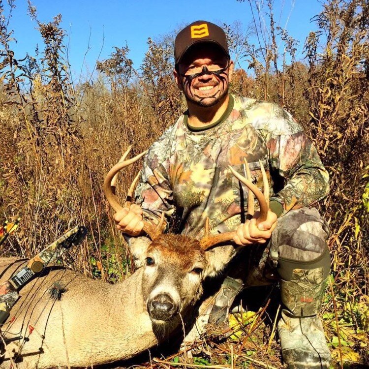 Matt with a white-tailed buck in Midland County