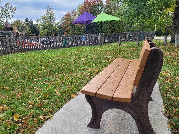 Memorial bench outside Fun Zone in Plymouth Park