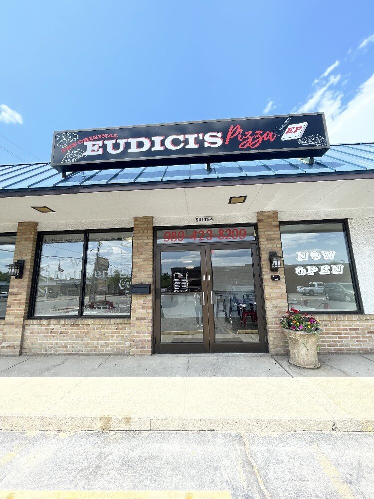 Eudici's Pizza is located at 318 S. Saginaw Road in Midland.