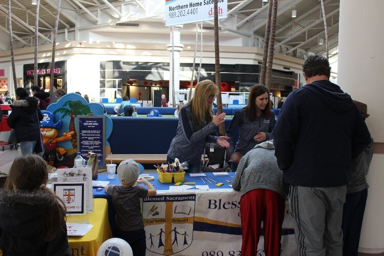 Businesses and non-profits provide craft, activities, information, and games.