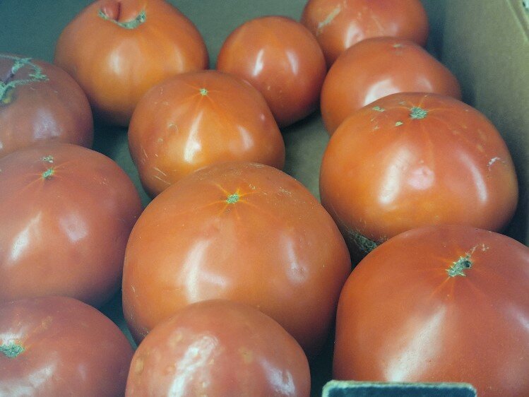 Fresh produce and meat are for sale at Mama's.