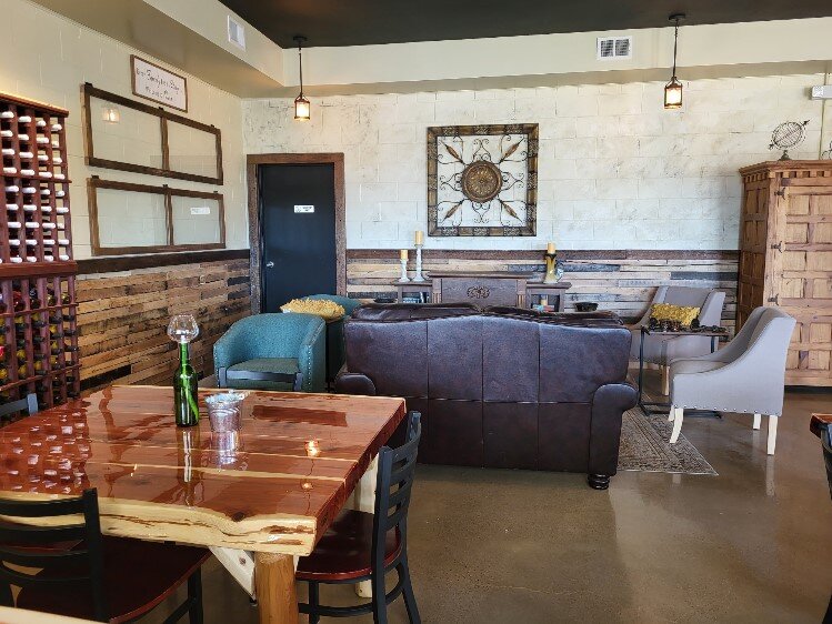 Crazy Vines has tables, a lounge area with a loveseat, and four comfortable chairs.