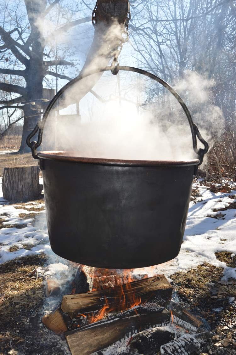 A huge pot was used to boil syrup in the 1870s.