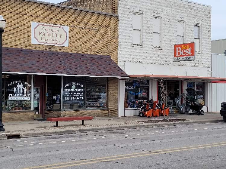 Coleman Family Pharmacy and Bass Hardware anchor downtown Coleman.