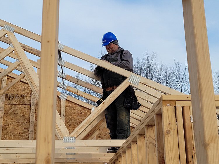 The units were designed by Habitat’s local construction manager, Erich Ostrander, but the work is volunteer-driven.