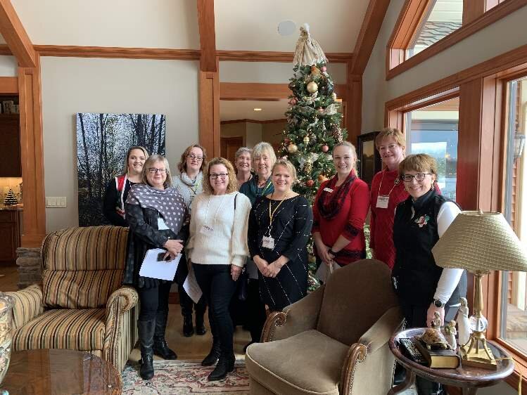 Some members of the Zonta Club of Midland gathered at one of the homes on the Homewalk.