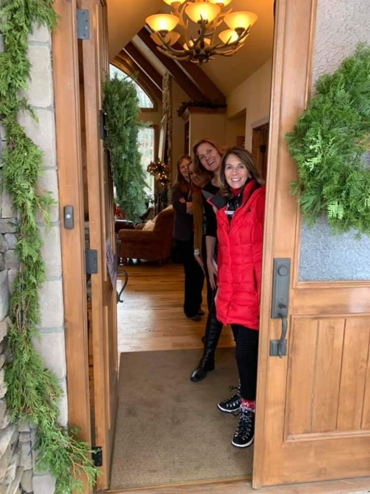 Zonta Club members greet their guests on the Homewalk.