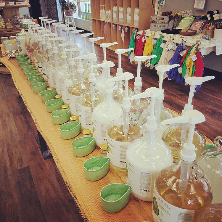 Featured items include household laundry and cleaning products, personal care items like shampoo, conditioners, lotions, body scrubs and more in the refill areas.