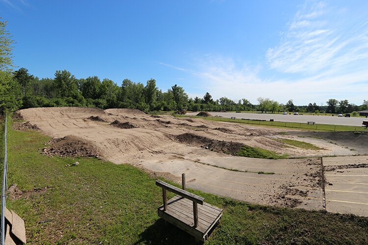 The new BMX track has no schedule yet for competitions. There's hope the track will open by the end of July, but funds to complete the fencing around the track still needs to be raised in order to open.