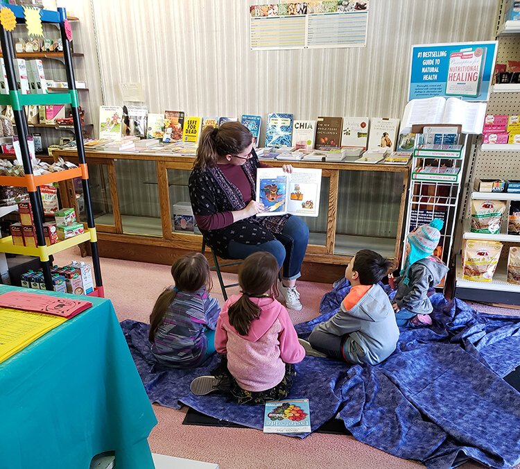 Librarians at Grace A. Dow Library picked out farm-themed picture books for the event, vetting them for age-appropriateness and to match the theme. (Photo taken pre-COVID)