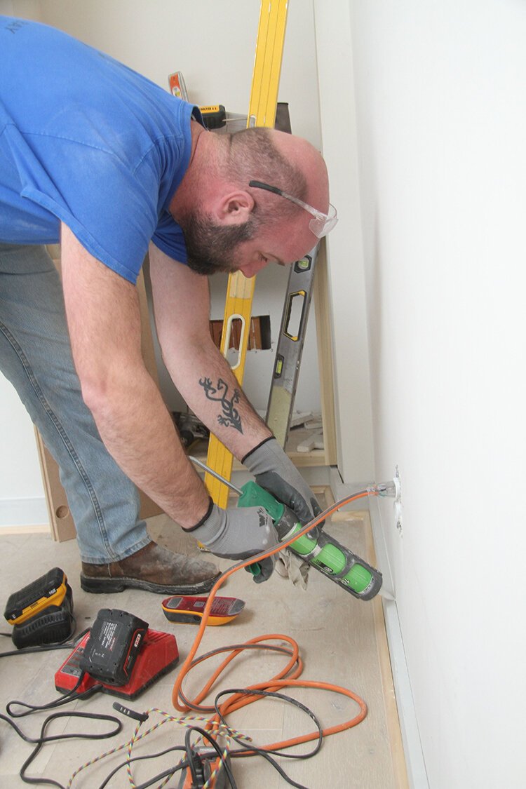 Custom finishes and concrete pavers were created for the condos.