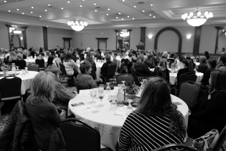 Women of the Great Lakes Bay Region gather to hear different discussion topics.