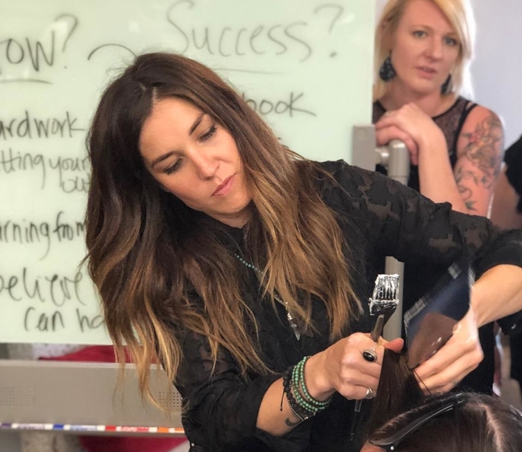 Mason teaching one of several classes she offers.