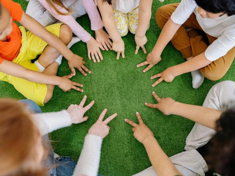 kids hands in a circle