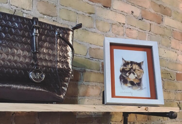 Accessories and clothing fill the shelves and racks at LuLu B's.