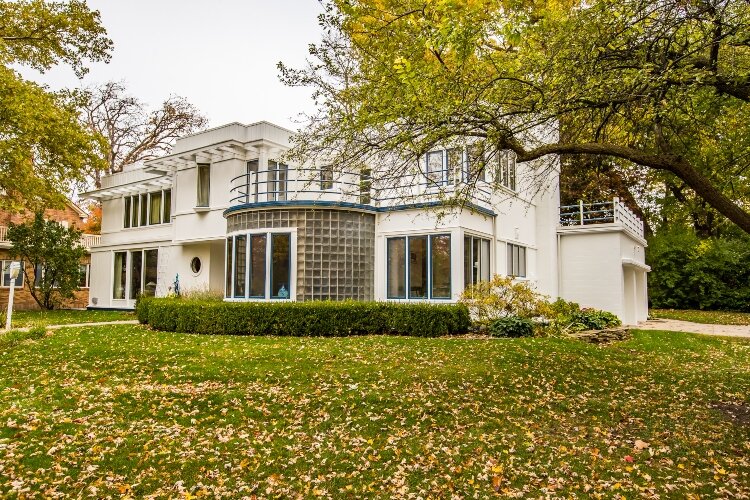 Smooth walls, flat roofs, rounded corners and windows that turn with the building are some of the distinguishing characteristics of the Goddeyne House at 2275 Carroll Road.