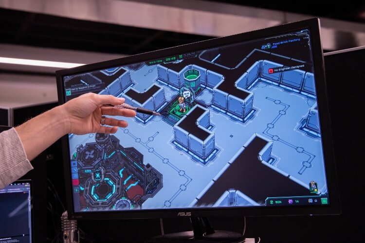 While demonstrating the game, Millershaski points out places where he built in features to entertain and challenge players.