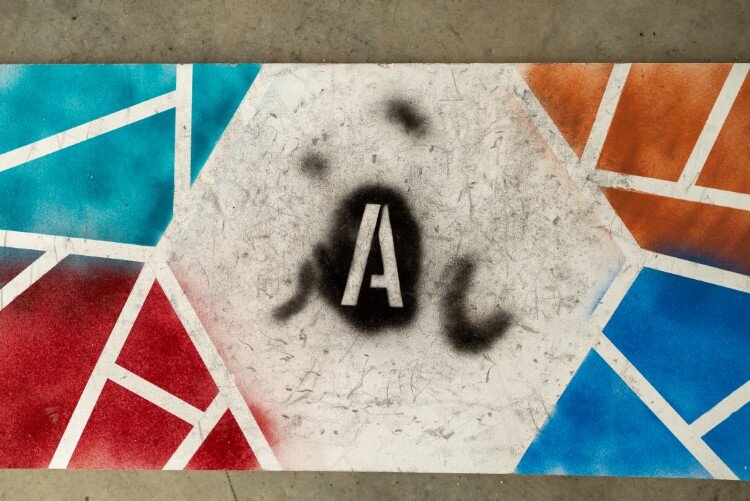 Each tap dance board was painted with letters spelling out Spark, the name of the performing arts mentorship and scholarship program.