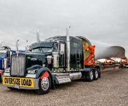 Paul Strpko, sales manager for Fisher Companies, at right, talks to Bay Aggregate Manager Kevin Cotter at the Fisher Port Terminals.