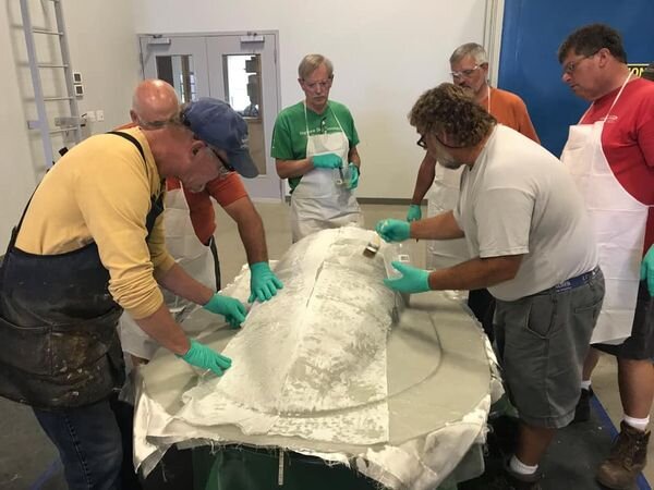 The bobsled is designed for maximum speed and aerodynamics while still protecting the riders.