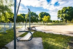 Crews removed traditional playground equipment inside Veterans Memorial Park on Bay City’s West Side.