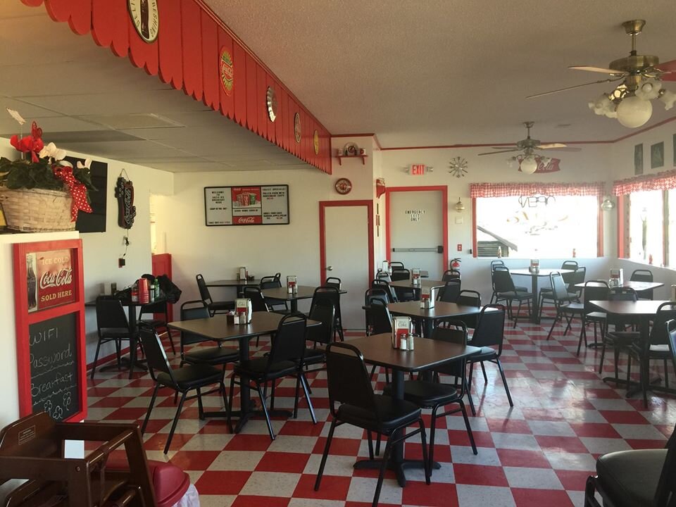 Suzie Q's Breakfast Nook is known for its Coca-Cola theme and house-made smoked meats.