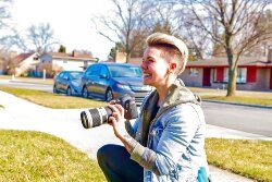 Photographer Ashley Brown stands 10 to 15 feet away from the people featured in her Porch Portraits Project.