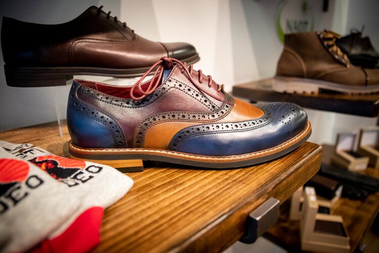 Men’s and women’s shoes and accessories fill Urban East.