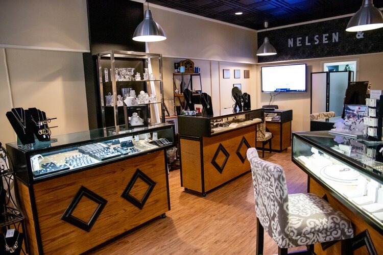 Nelsen & Co. carries jewelry and watches.
