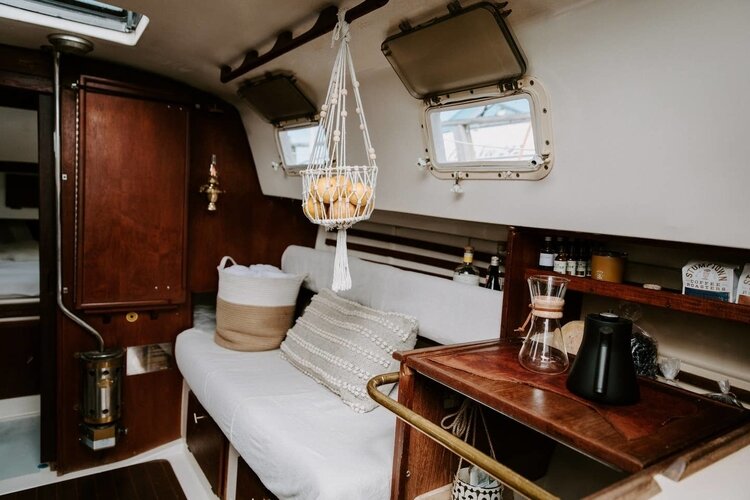 The boat comes fully stocked with electricity, a small kitchen, and an outdoor grill.