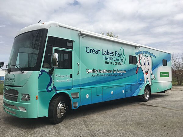 A mobile dental health program brings dental services to school-aged children in the Great Lakes Bay Region. In the summer, the buses travel throughout lower Michigan providing dental services to migrant and seasonal agricultural workers.